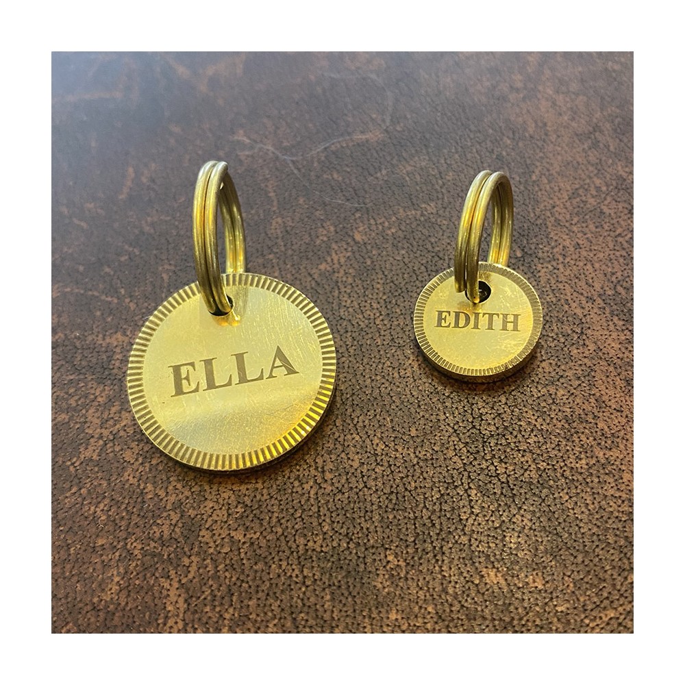 Dog sign in brass